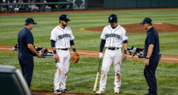 Two Mariners outfielders exit game with injuries